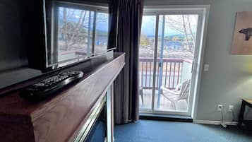 Three-Bedroom Apartment 116 - Loft, No air conditioning | Living area | Flat-screen TV, DVD player