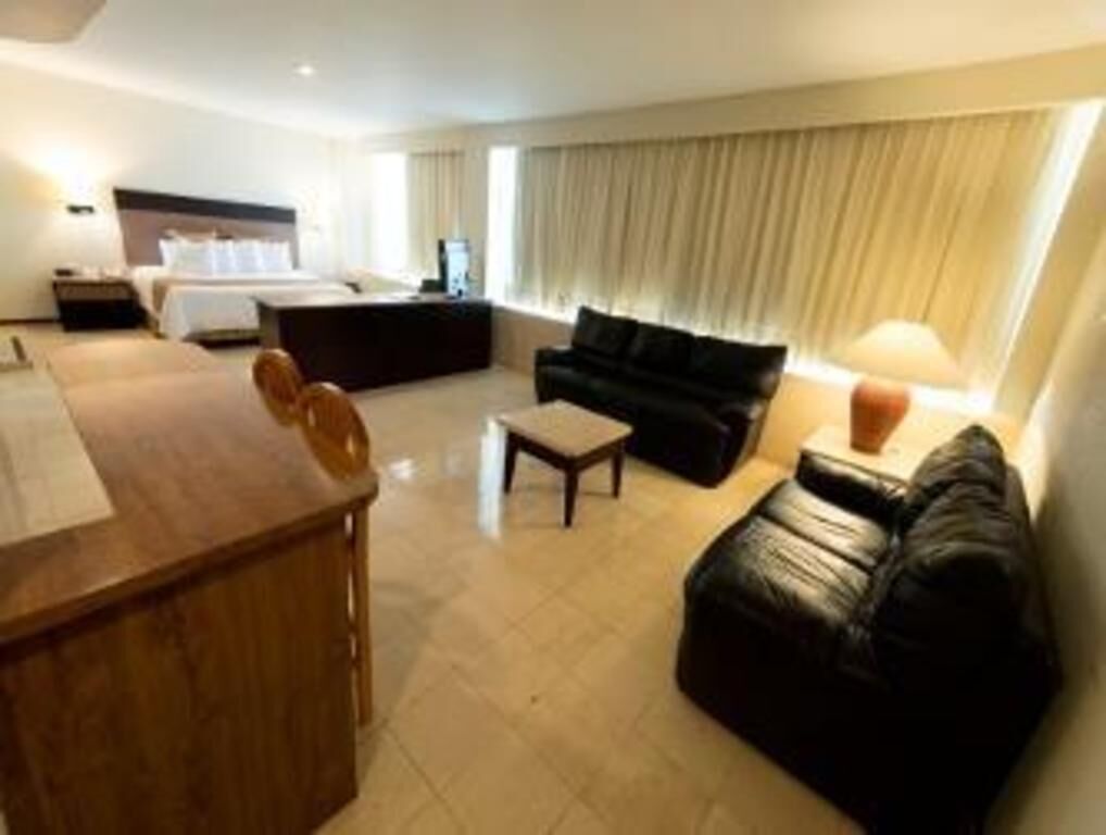 Edredón, camas con pillow-top y caja de seguridad en la habitación 