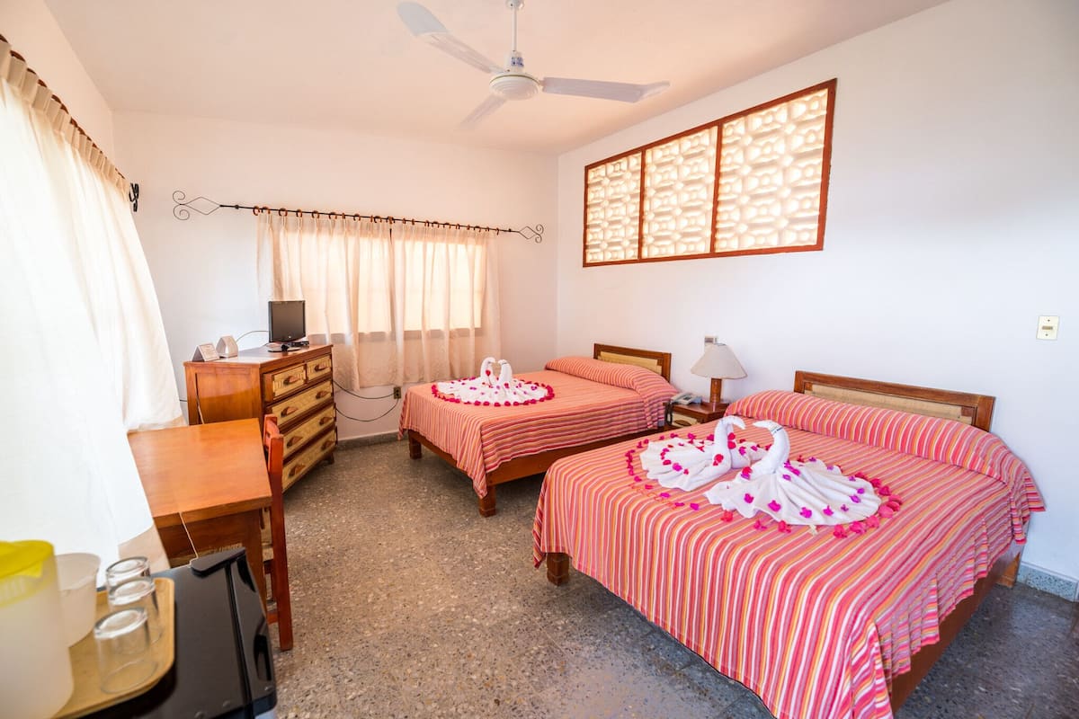 Tropical View | Caja fuerte, cunas gratuitas, ropa de cama