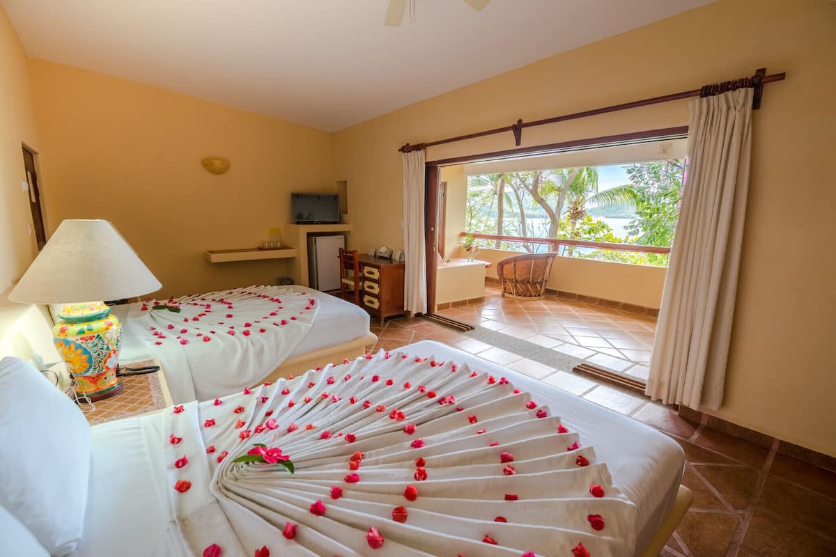 Beach View Suite | Caja fuerte, cunas gratuitas, ropa de cama