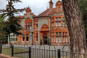 A historic building with ornate architecture, featuring multiple windows and a prominent entrance. - Sure Hotel by Best Western Reading (Reading)
