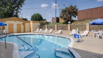Seasonal outdoor pool, open 9:00 AM to 10:00 PM, pool umbrellas
