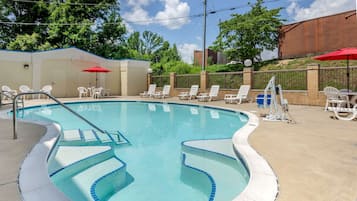 Seasonal outdoor pool, open 9:00 AM to 10:00 PM, pool umbrellas