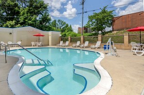 Seasonal outdoor pool, open 9:00 AM to 10:00 PM, pool umbrellas