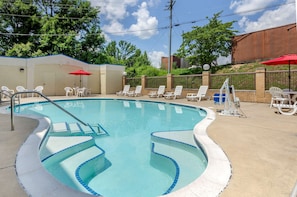 Seasonal outdoor pool, open 9:00 AM to 10:00 PM, pool umbrellas