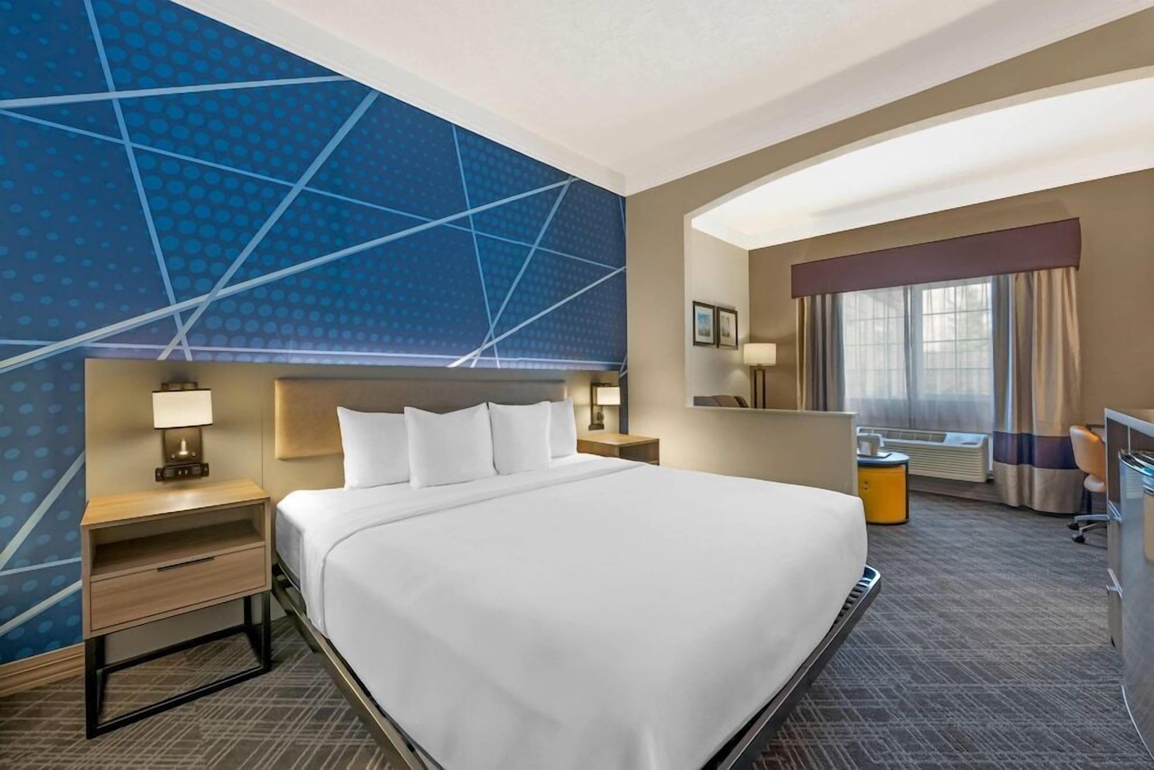 Premium bedding, pillowtop beds, desk, laptop workspace