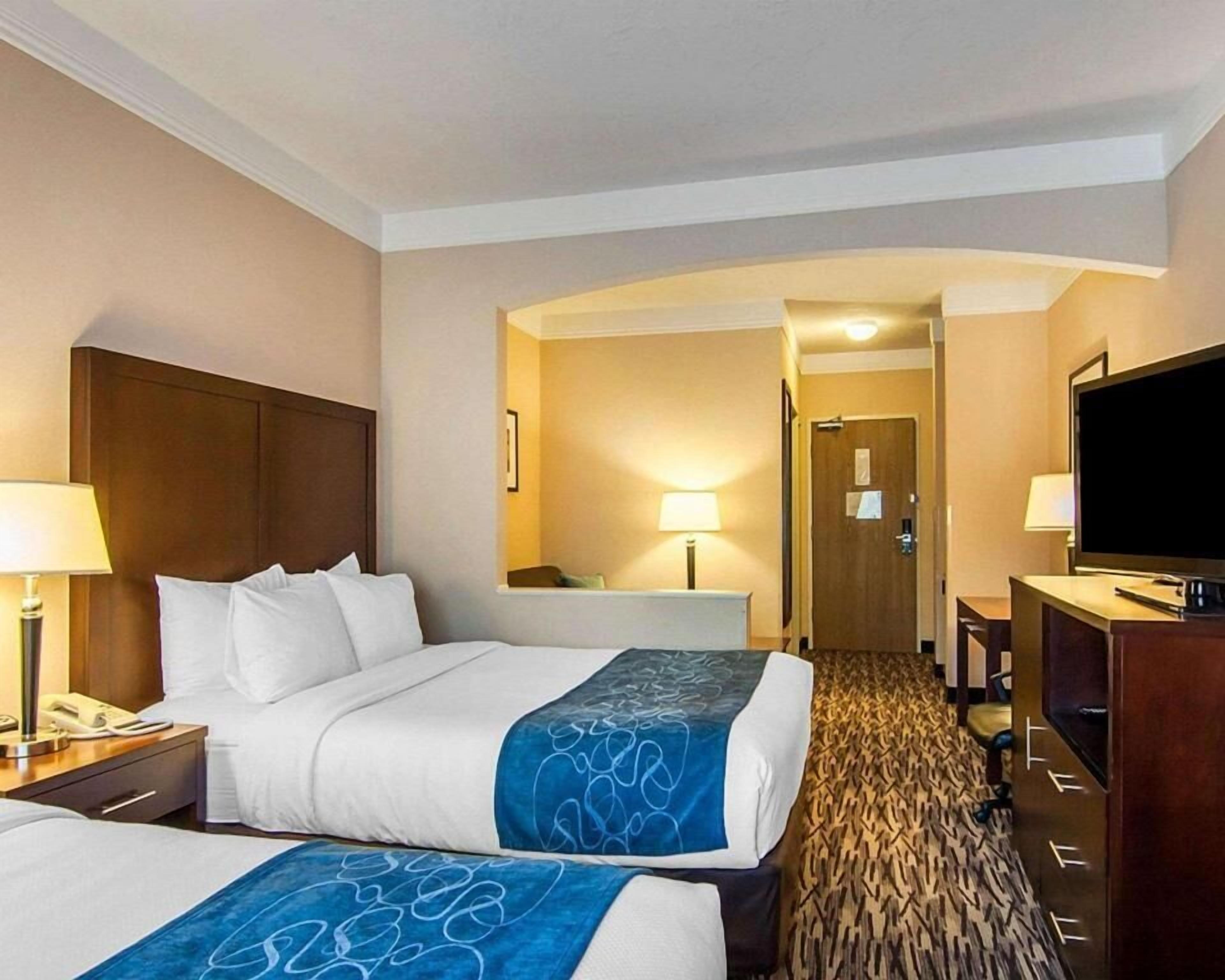 Premium bedding, pillowtop beds, desk, laptop workspace