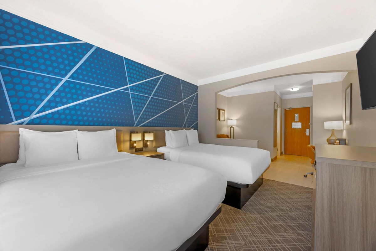 Premium bedding, pillowtop beds, desk, laptop workspace