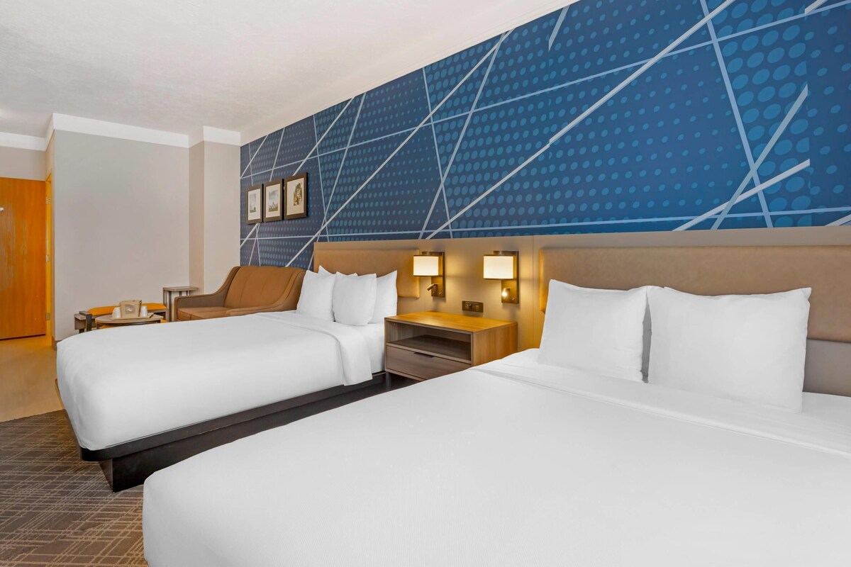 Premium bedding, pillowtop beds, desk, laptop workspace