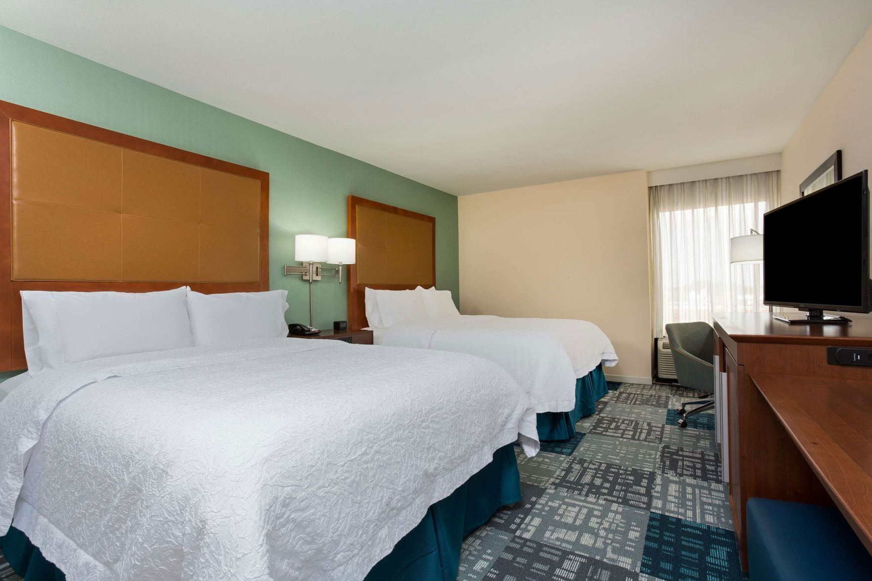 Desk, laptop workspace, free WiFi, bed sheets