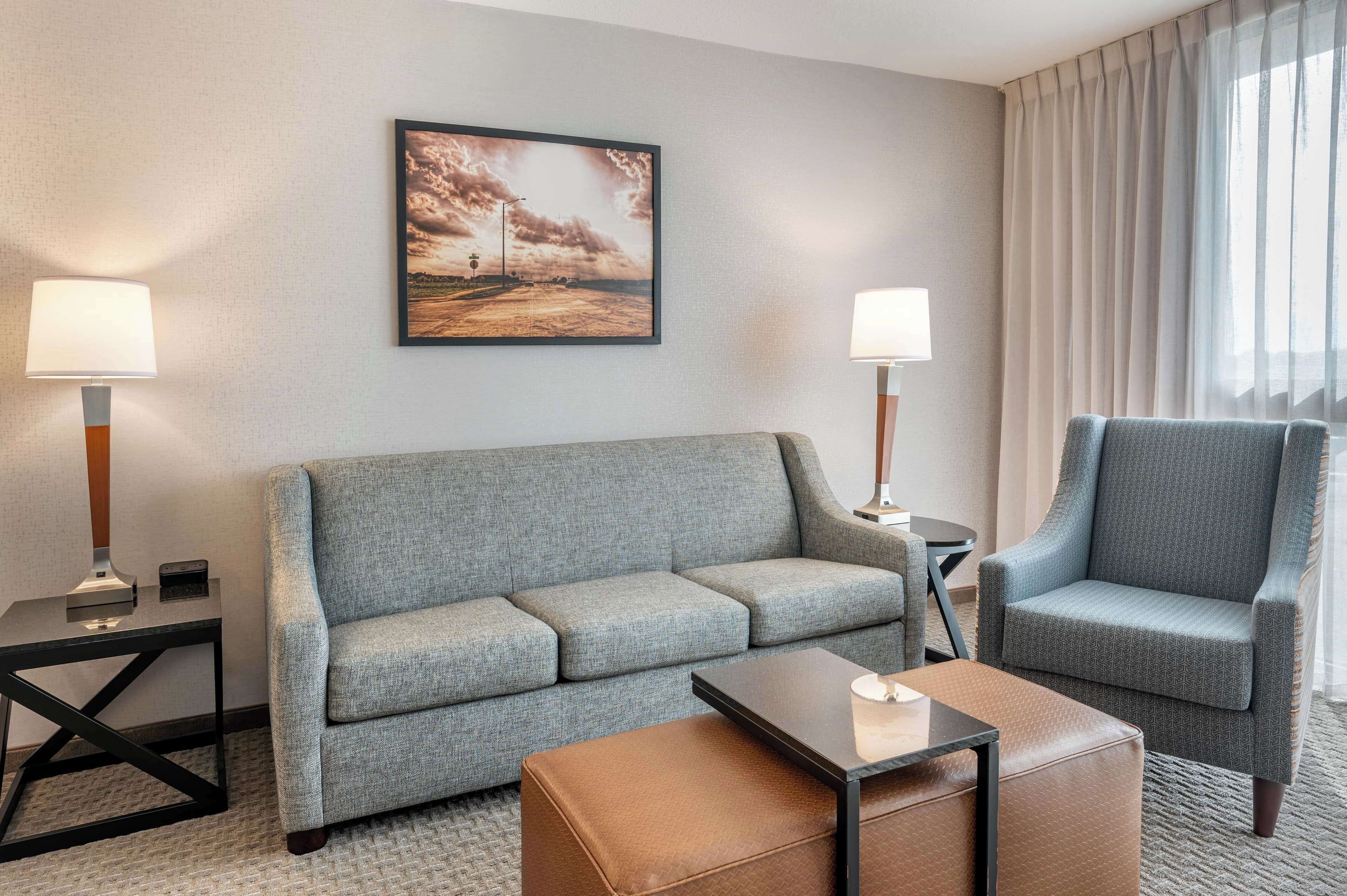 deluxe suite, 1 king bed with sofa bed, refrigerator & microwave (2 rooms, oversized, upper floor) | desk, laptop workspace, blackout curtains, iron/ironing board