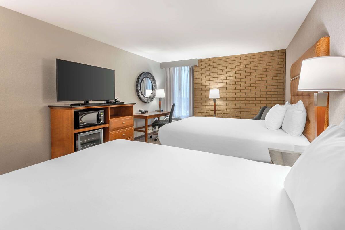 desk, laptop workspace, blackout curtains, iron/ironing board