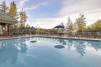 Indoor pool, outdoor pool, sun loungers at Hilton Vacation Club Lake Tahoe Resort South
