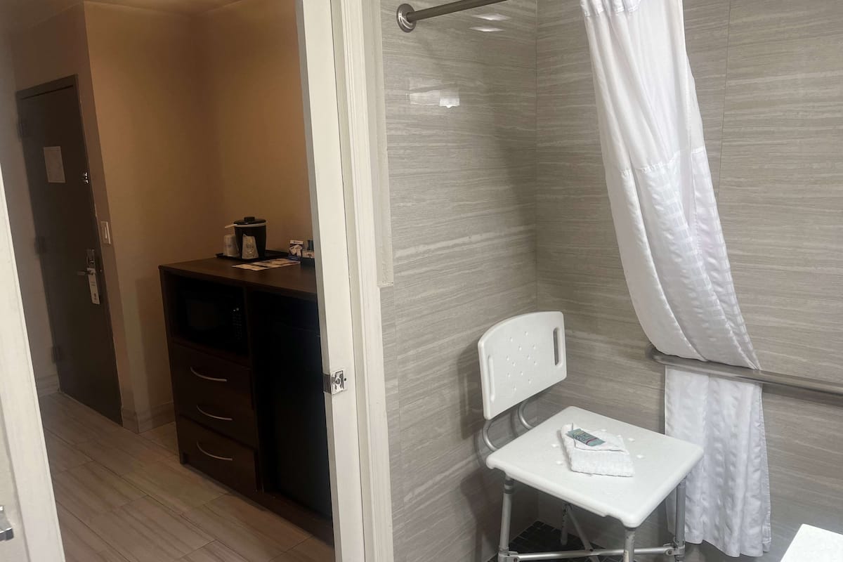 standard room, 2 queen beds, accessible, refrigerator & microwave (pet friendly) | laptop workspace, blackout curtains, iron/ironing board, bed sheets