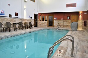 Indoor pool, open 7:00 AM to 10 PM, pool loungers