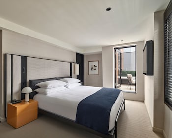 Premium NoMad King Balcony | Premium bedding, down comforters, pillowtop beds, minibar at Hotel AKA NoMad