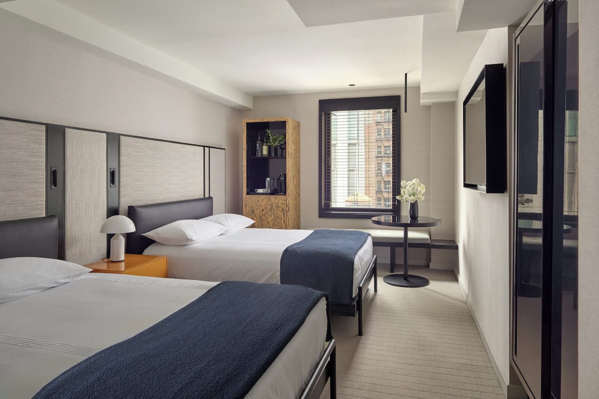 Premium bedding, down duvets, pillow-top beds, minibar