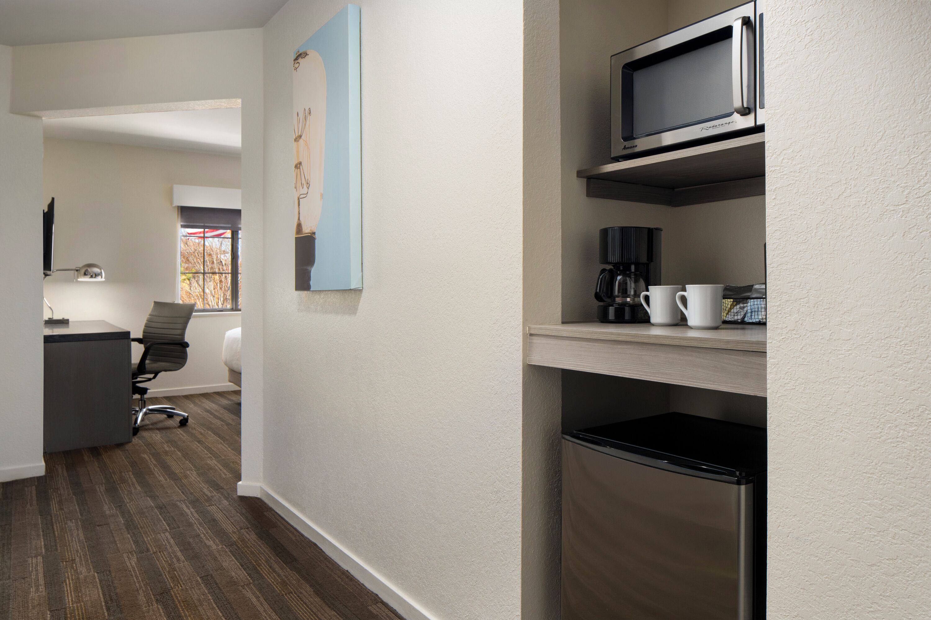 premium bedding, pillow-top beds, laptop workspace, iron/ironing board