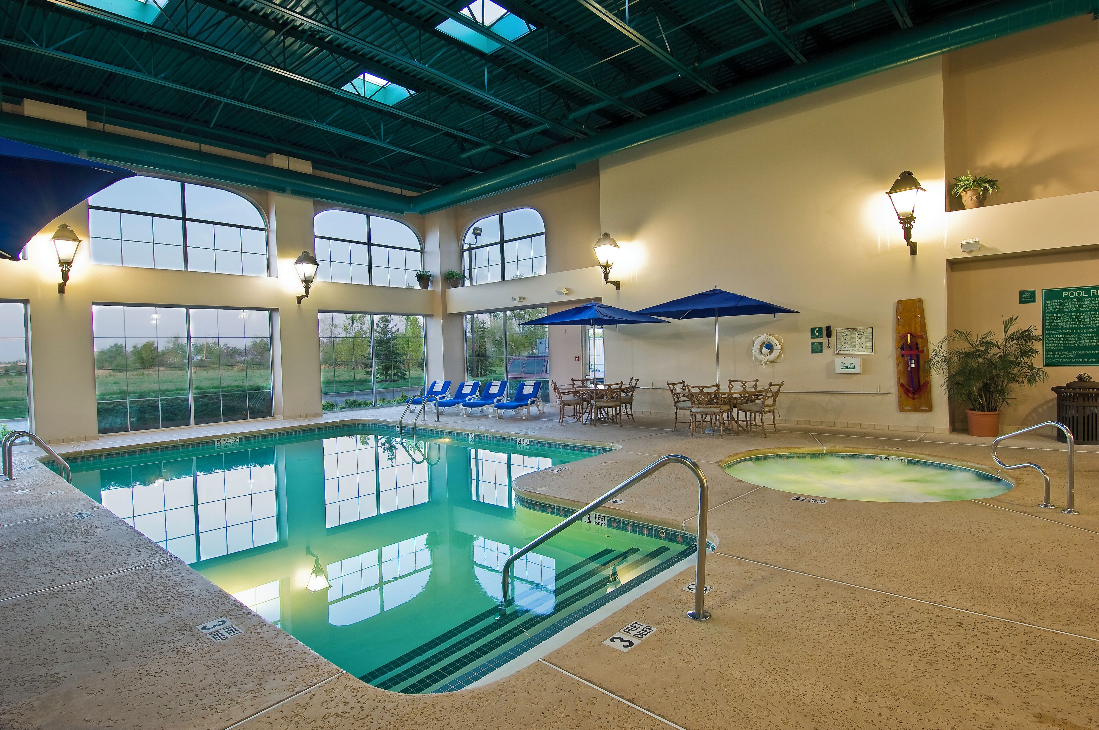 indoor pool, open 9:00 am to 10:00 pm, pool loungers