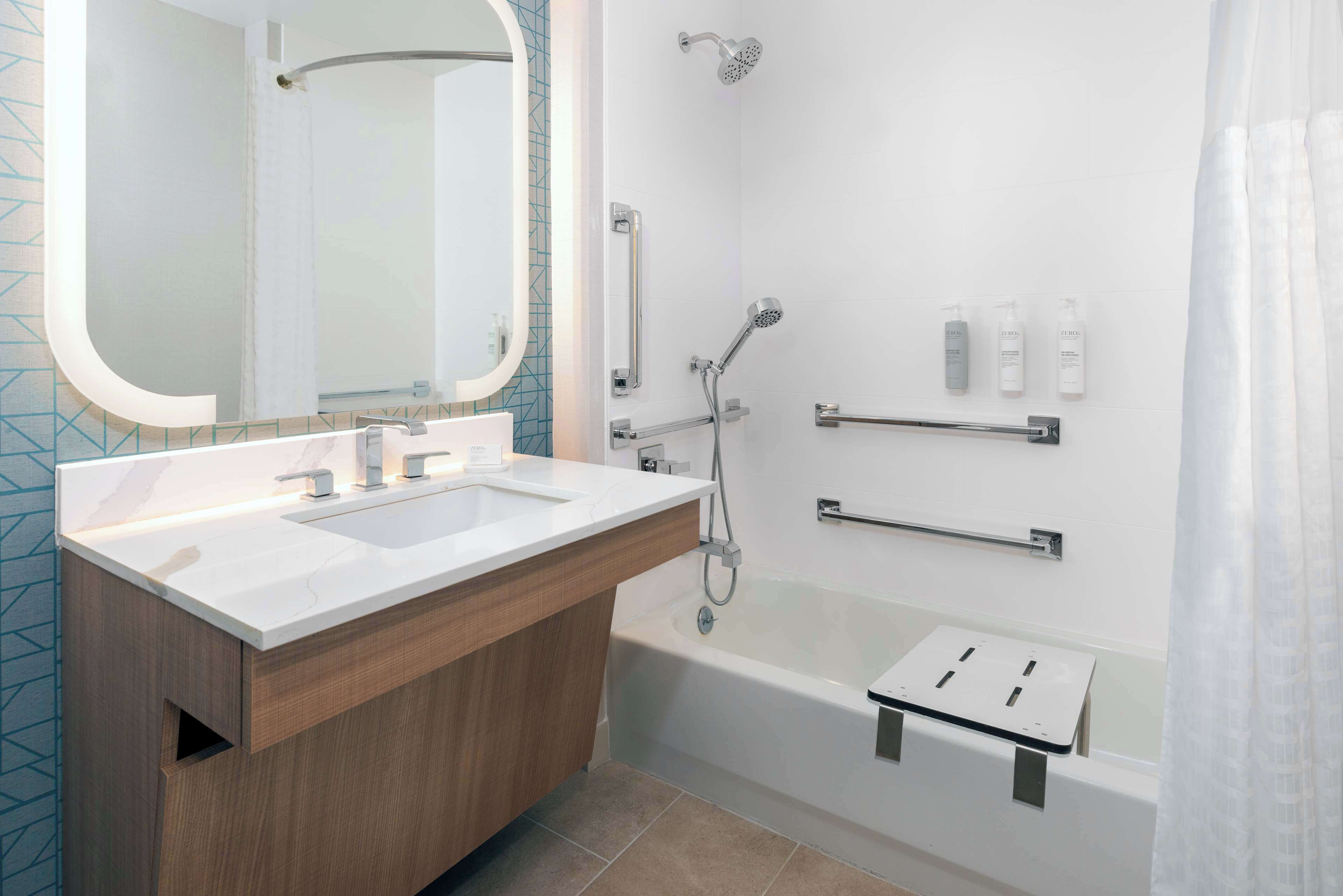 hydromassage showerhead, free toiletries, hair dryer, towels