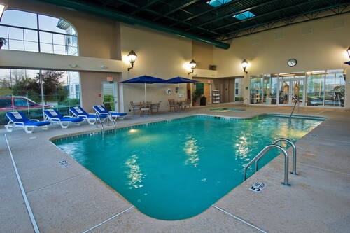 Indoor pool, open 9:00 AM to 10:00 PM, sun loungers