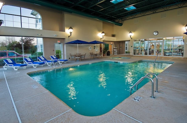 Indoor pool, open 9:00 AM to 10:00 PM, pool loungers
