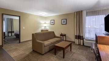 Suite, 1 King Bed, Non Smoking | Down comforters, in-room safe, desk, blackout drapes