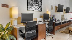A business center with desks, computers, and a large framed photograph on the wall. - Best Western Plus Wenatchee Downtown Hotel (Wenatchee)