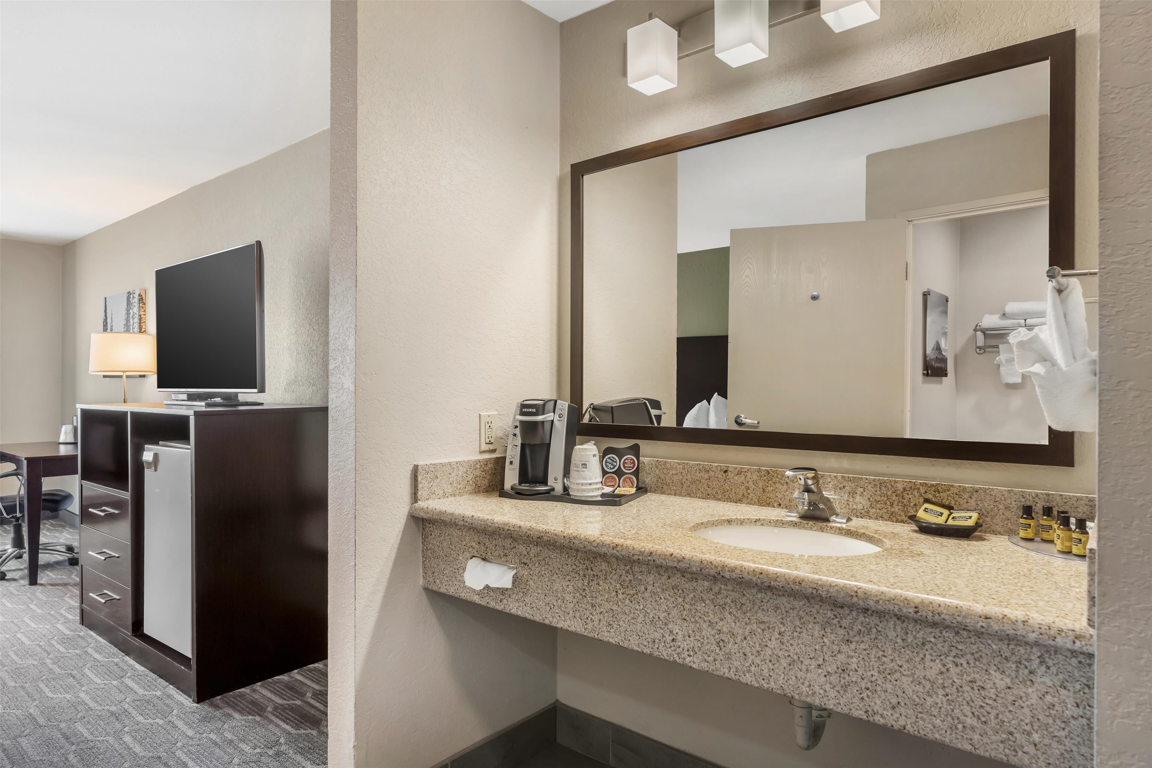 standard room, 2 queen beds, non smoking, microwave | bathroom | combined shower/bathtub, rainfall showerhead, free toiletries