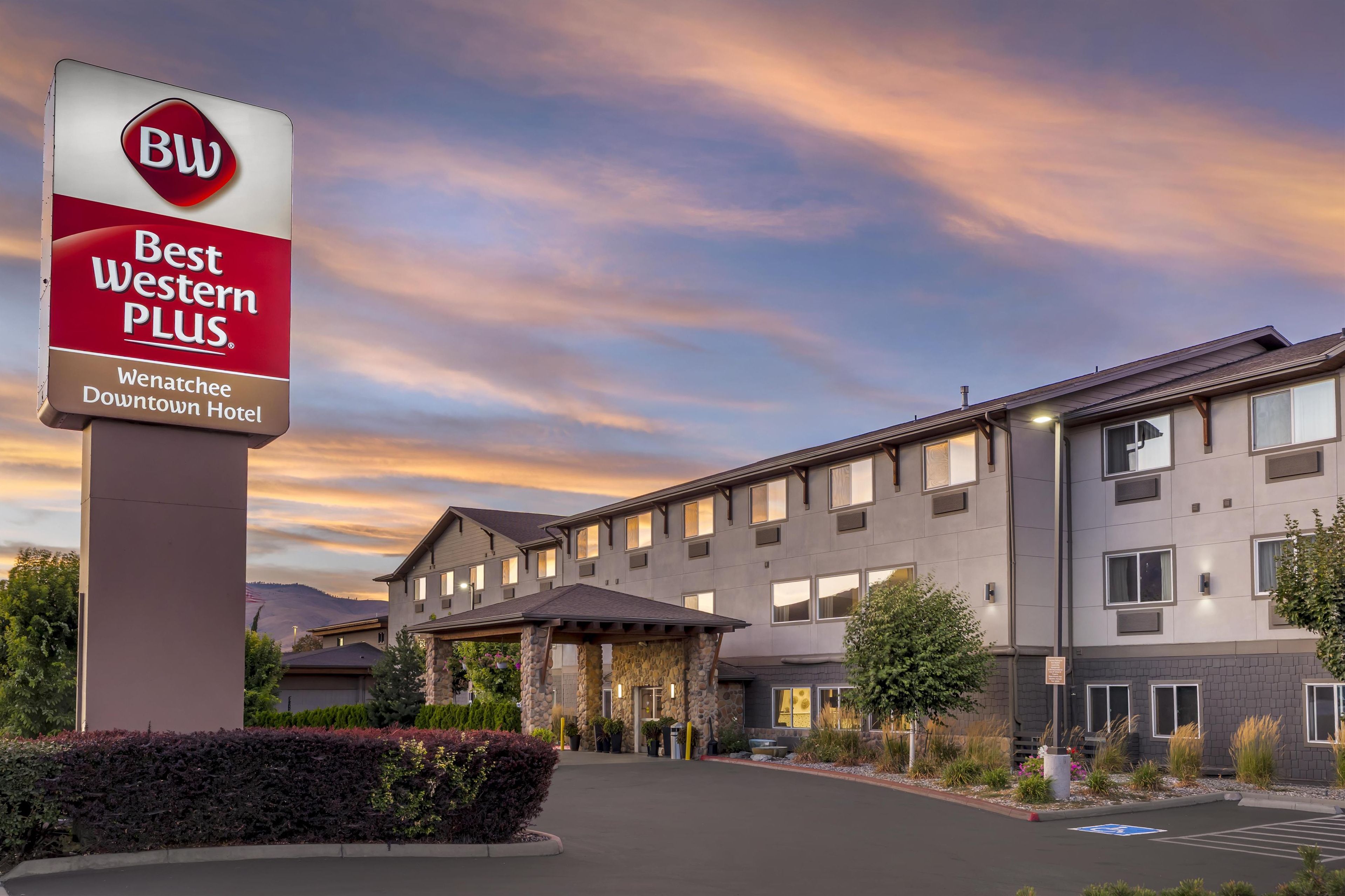 A Best Western Plus hotel with a modern facade, multiple floors, and a landscaped entrance.