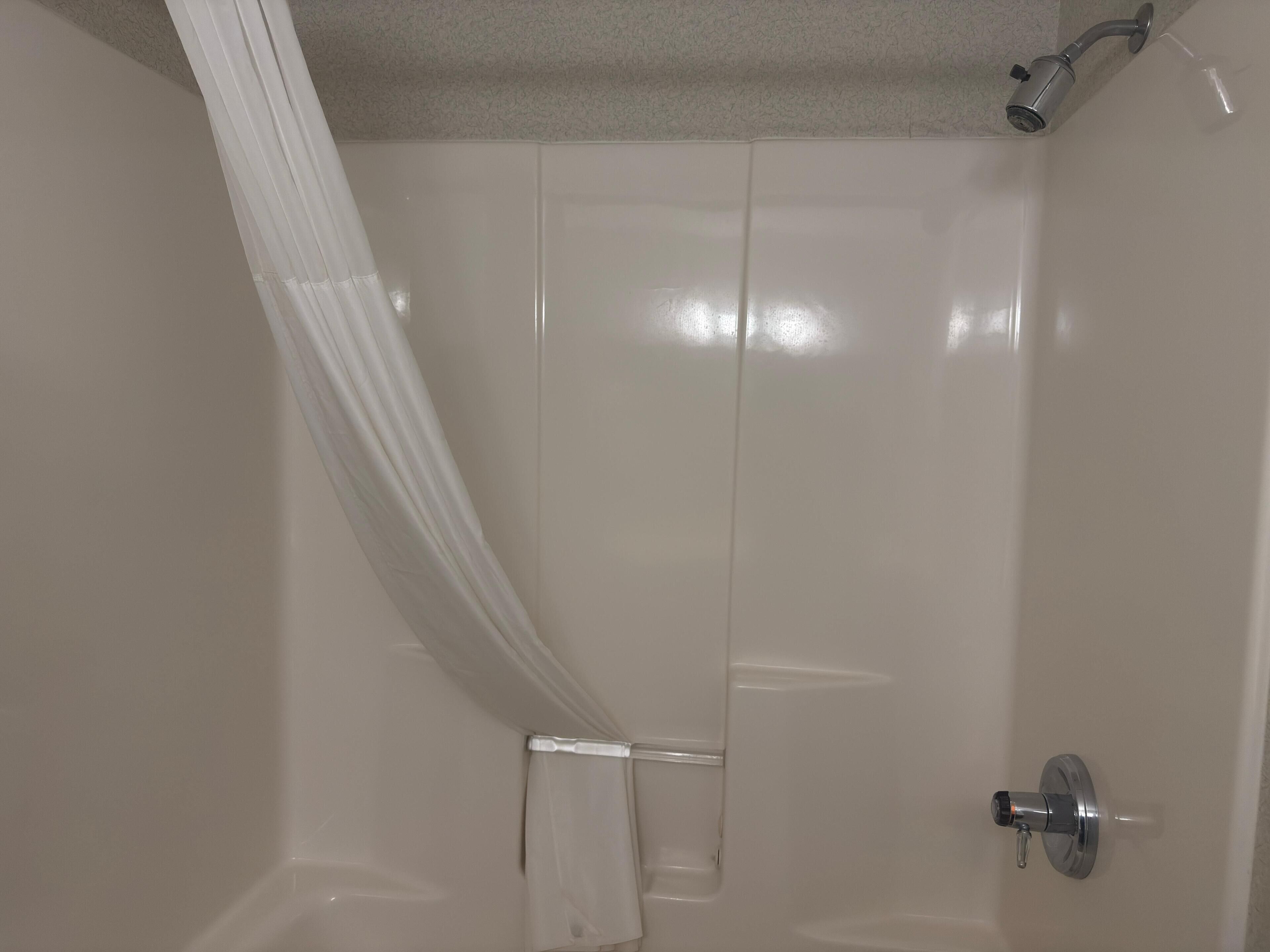 combined shower/bathtub, free toiletries, hair dryer, towels