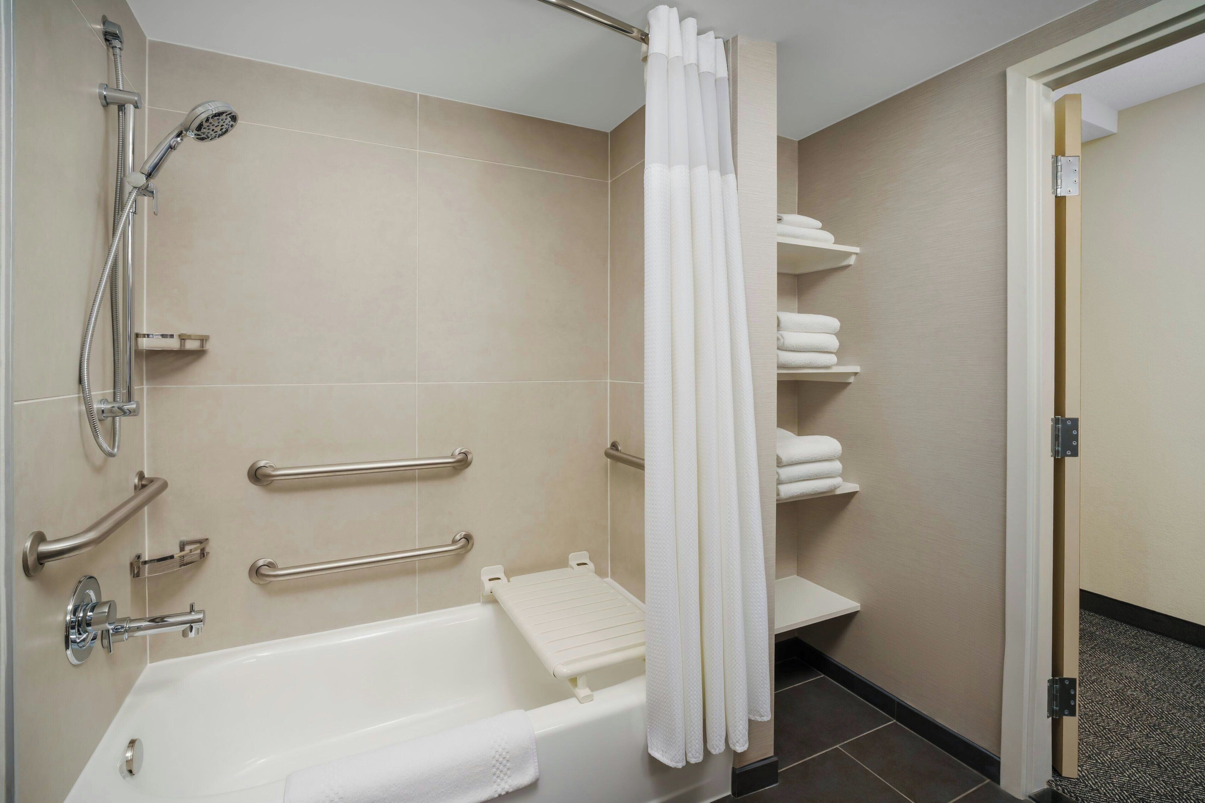 combined shower/bathtub, free toiletries, hair dryer, towels