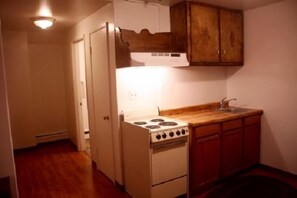 Frigorífico y microondas en la zona común