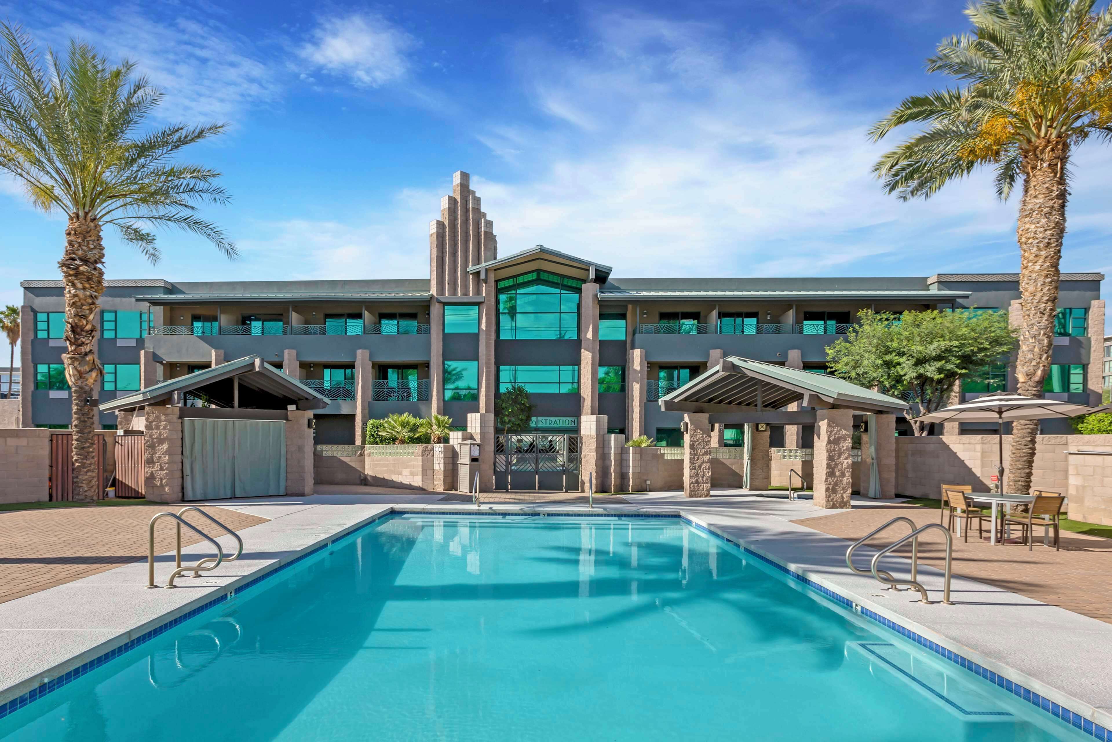 outdoor pool, open 8 am to 8 pm, pool loungers