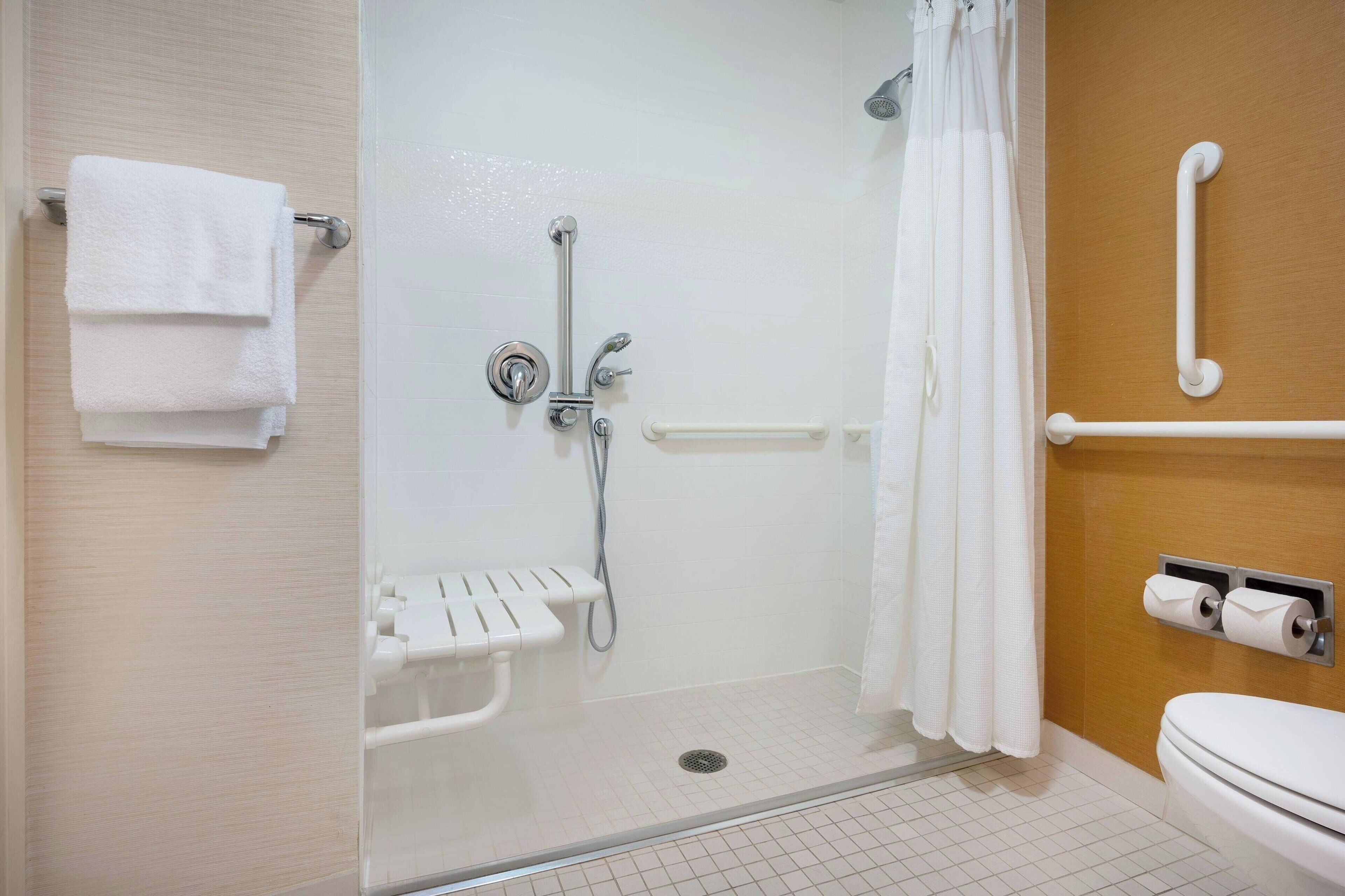 combined shower/bathtub, free toiletries, hair dryer, towels