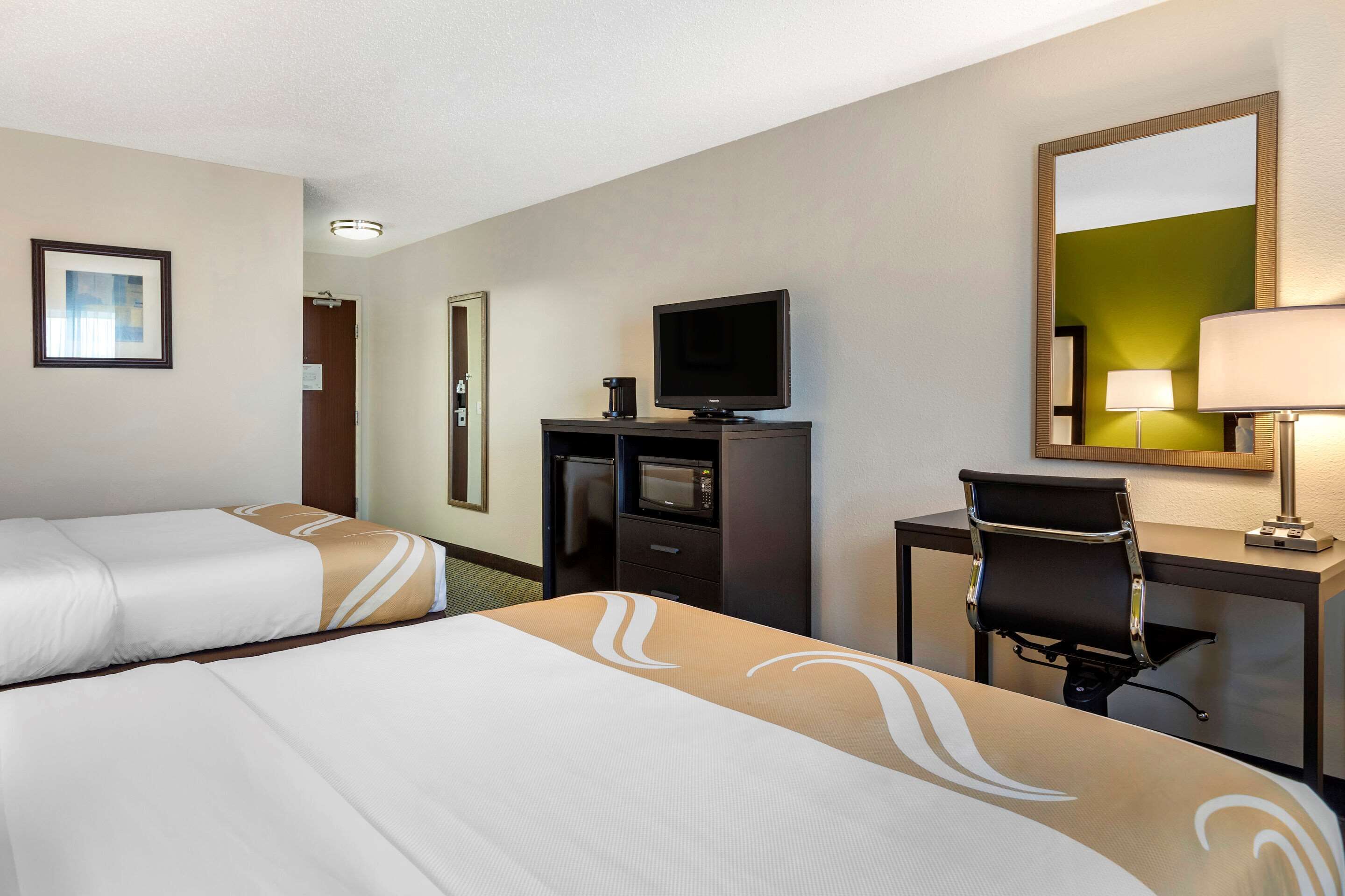 desk, laptop workspace, blackout curtains, iron/ironing board