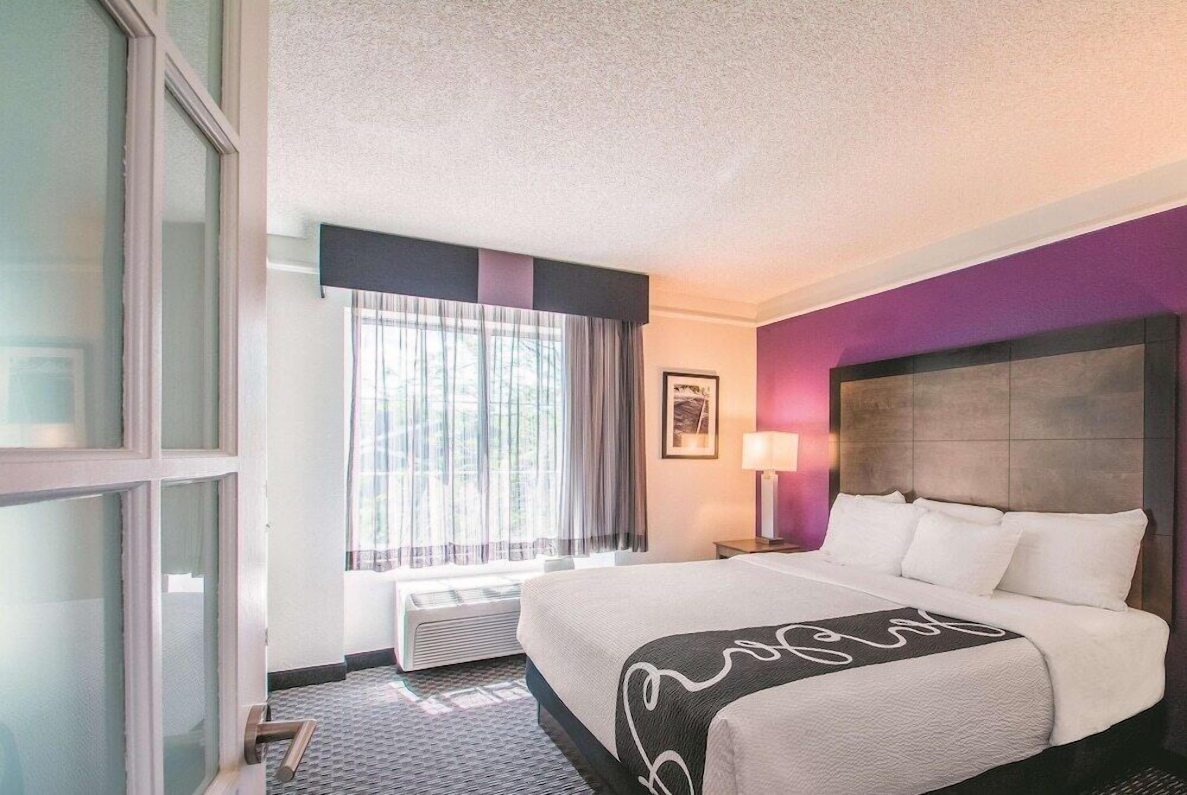Premium bedding, desk, blackout curtains, iron/ironing board