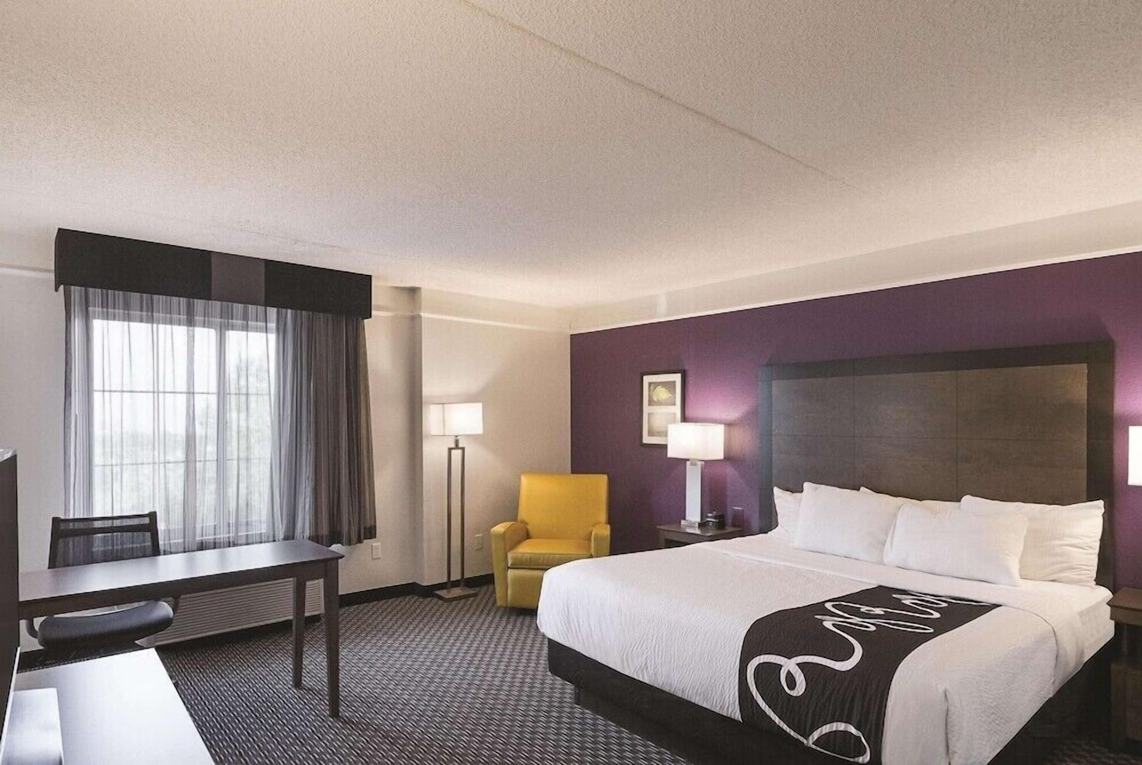 Premium bedding, desk, blackout curtains, iron/ironing board