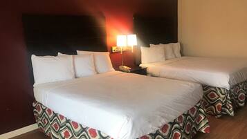 Desk, laptop workspace, blackout drapes, free cribs/infant beds