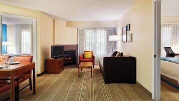 In-room safe, desk, iron/ironing board, cribs (free)