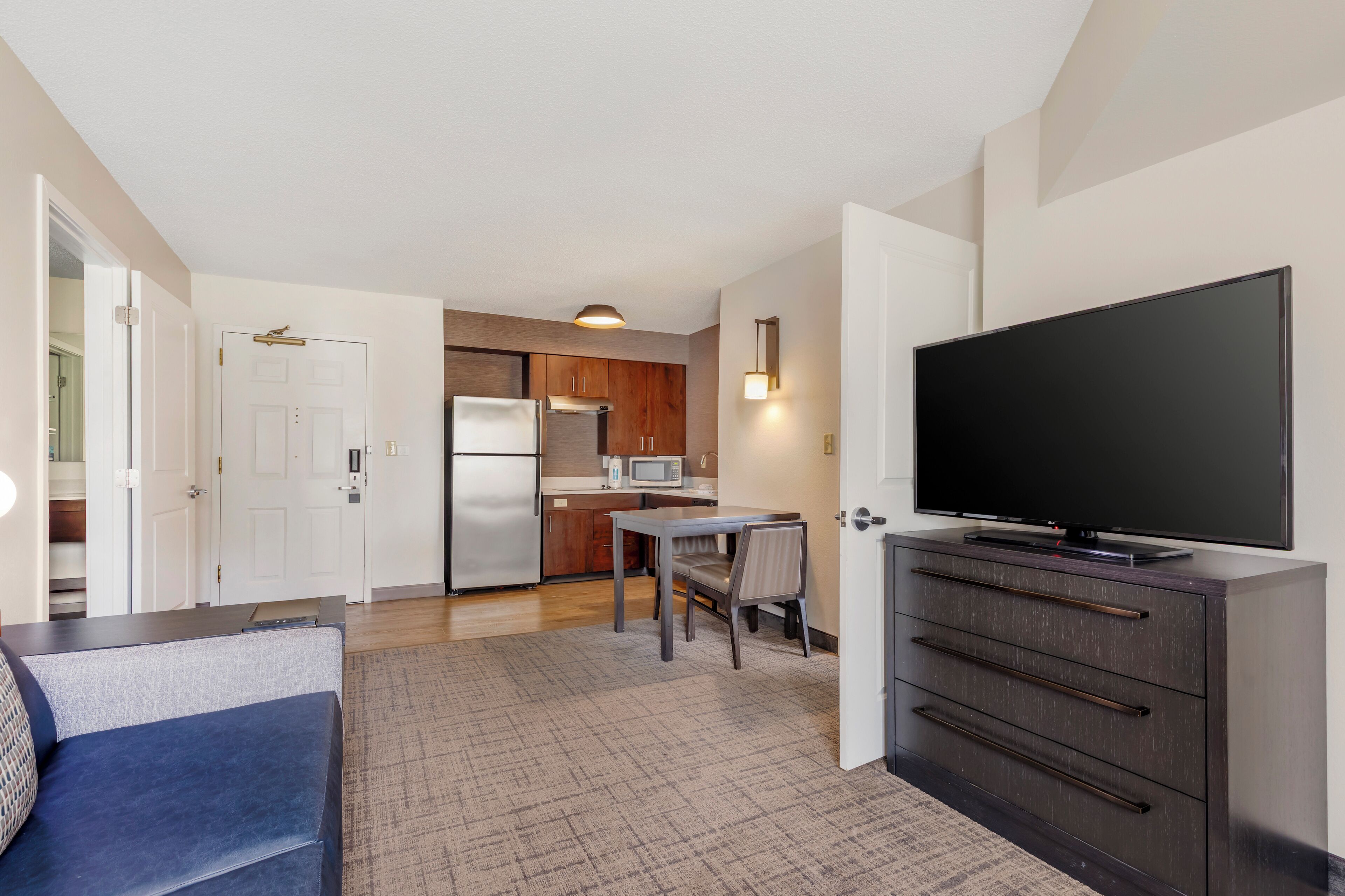 Suite, Multiple Beds, Accessible (Two Bedroom 2 Queens-Roll in Shower) | Living area | 50-inch LED TV with digital channels, TV, Netflix