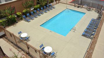 Seasonal outdoor pool, open 9:00 AM to 10:00 PM, pool umbrellas