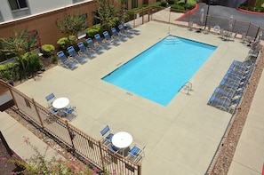 Seasonal outdoor pool, pool umbrellas, pool loungers