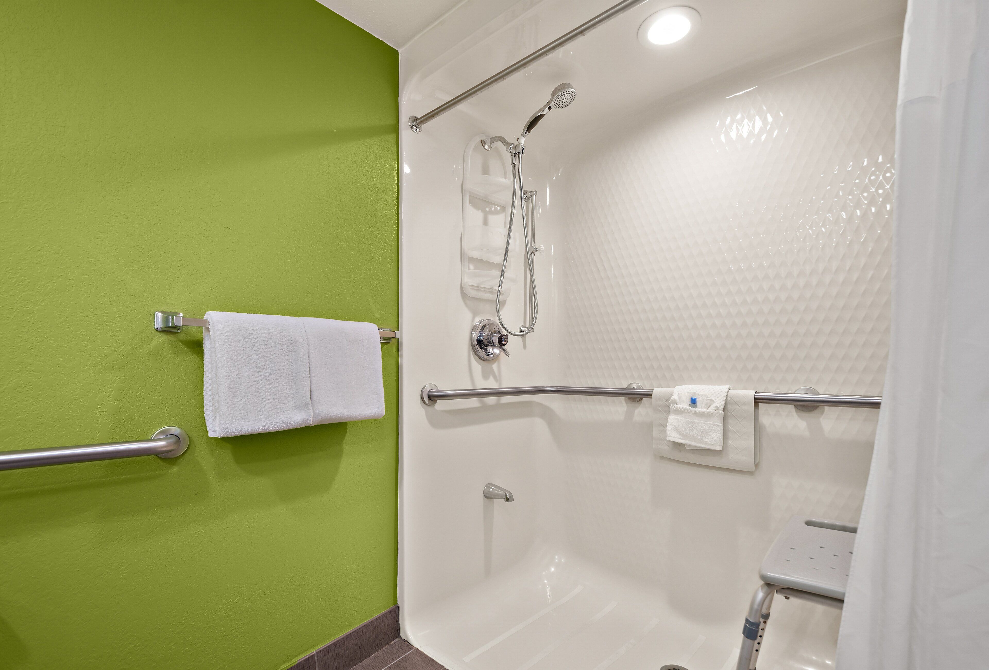 business room, 1 queen bed, accessible, non smoking (roll-in shower) | bathroom | shower, hair dryer, towels, soap