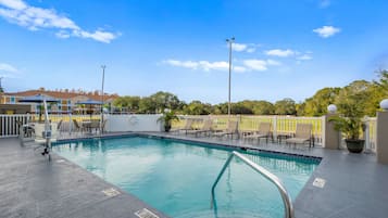 Outdoor pool, pool umbrellas, sun loungers