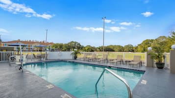 Outdoor pool, open 9:00 AM to 9:00 PM, pool umbrellas, sun loungers