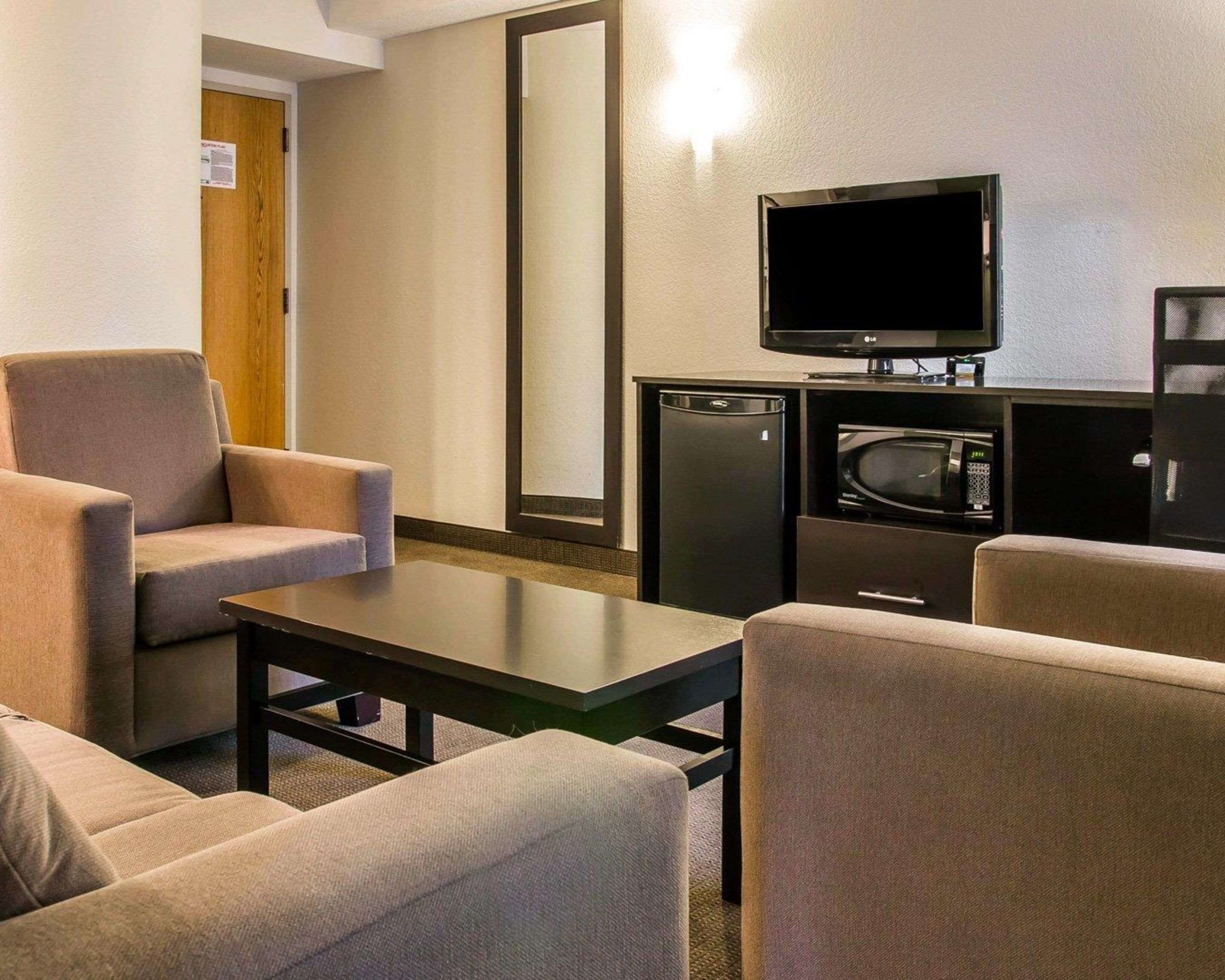 premium bedding, desk, blackout curtains, iron/ironing board