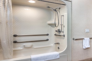 Room, 1 King Bed, Accessible, Non Smoking (Mobility) | Bathroom | Shower, free toiletries, hair dryer, towels - Howard Johnson Hotel & Suites by Wyndham Vancouver (Vancouver)
