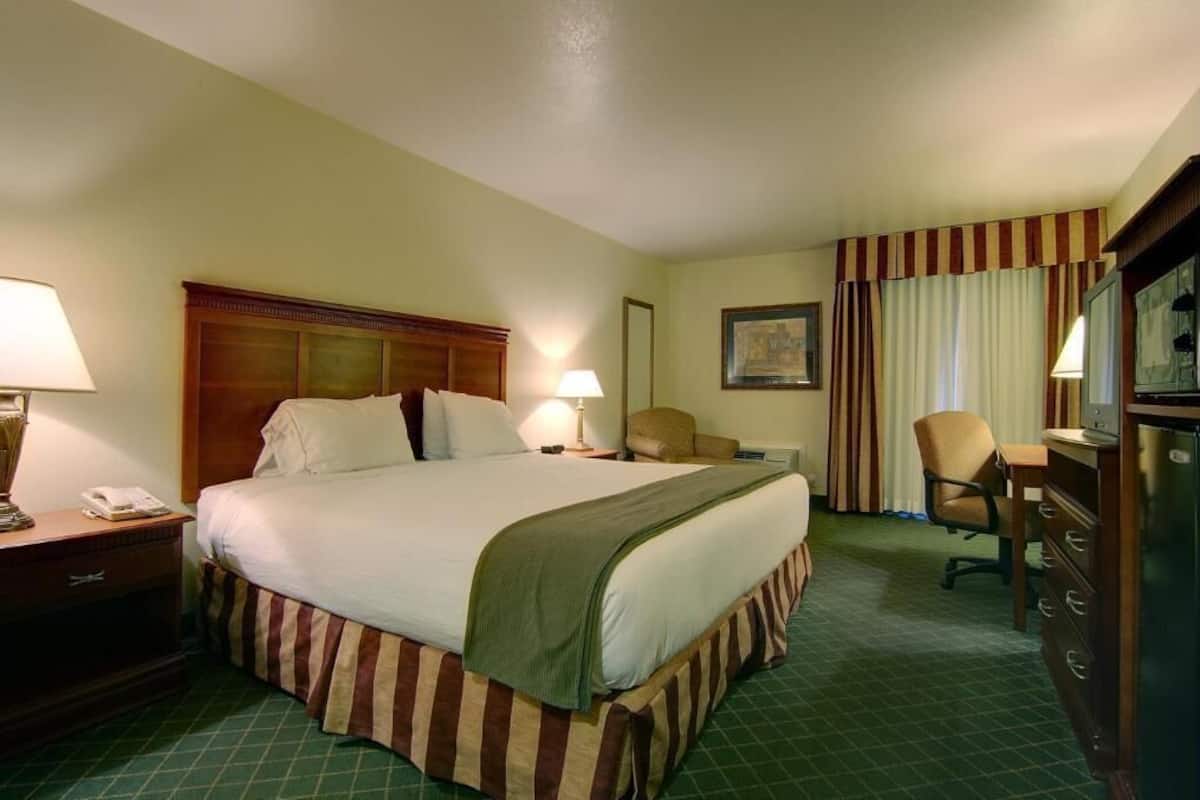 Down comforters, desk, blackout drapes, iron/ironing board