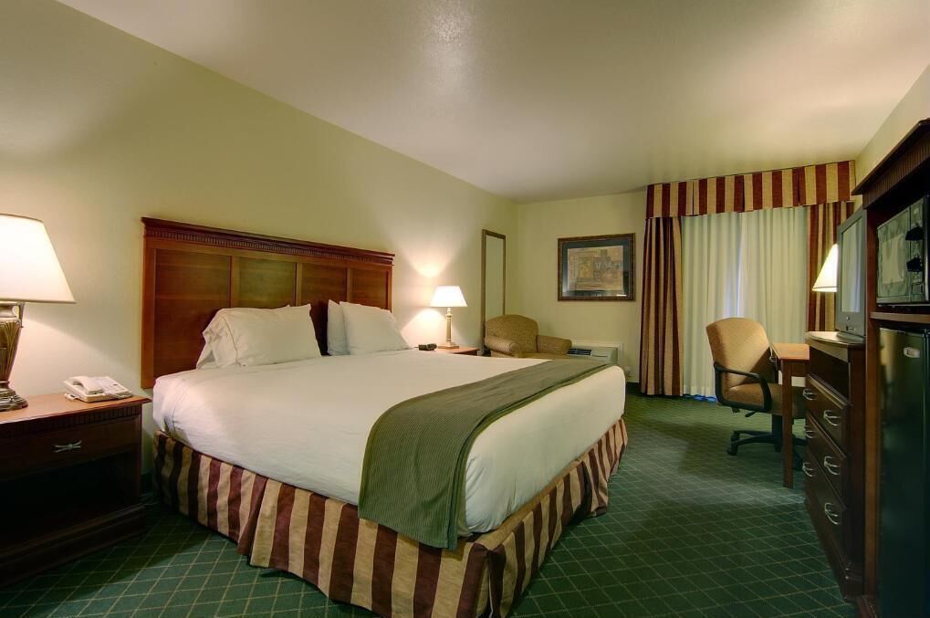 Down comforters, desk, blackout drapes, iron/ironing board